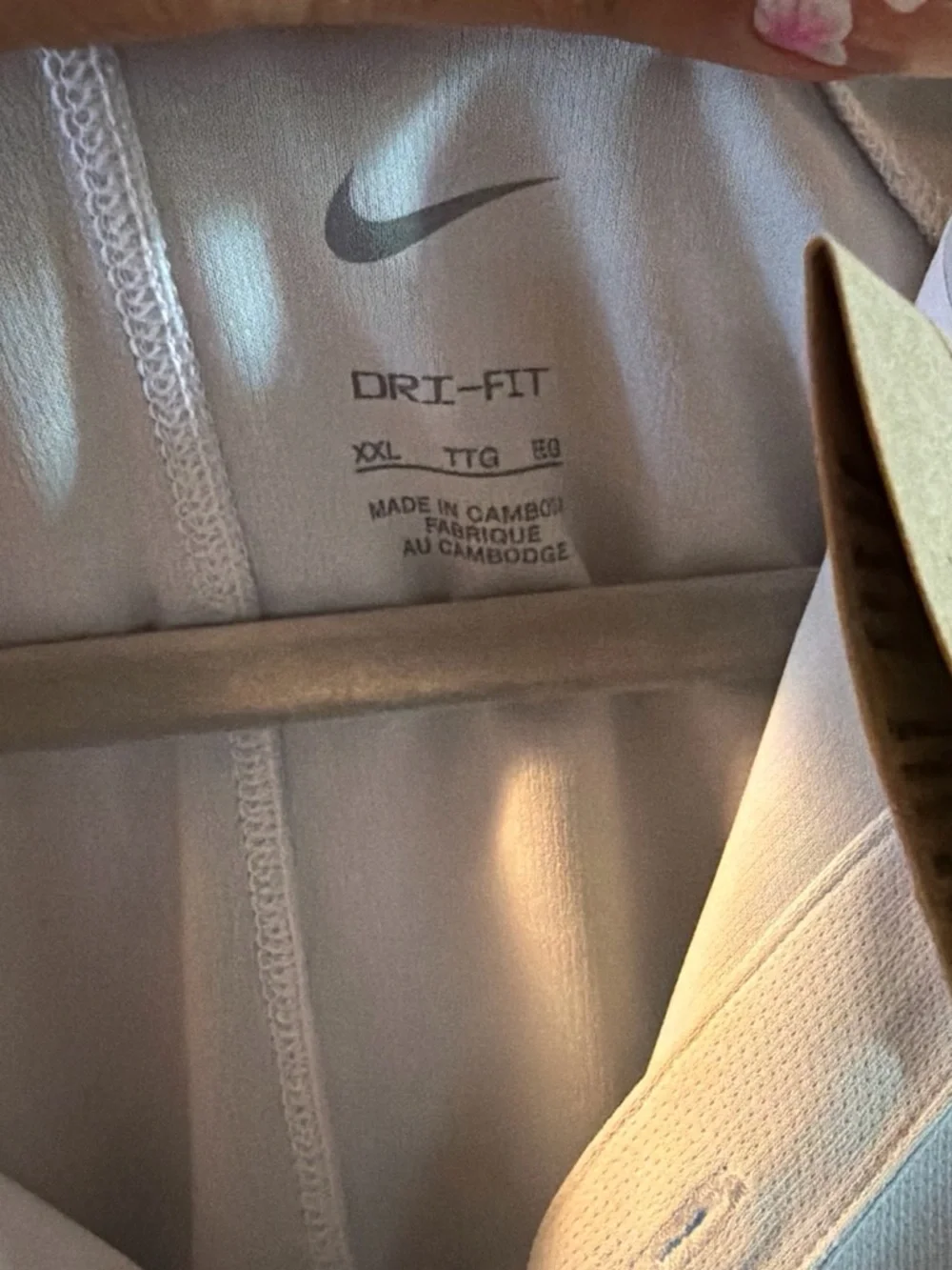 Nike Men’s Light gray Polo with Black Swoosh